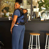 The Baby Carrier, Black with a baby inside