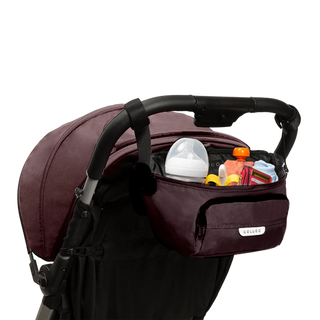 The On the Go Organizer, Cocoa with pacifiers in pockets