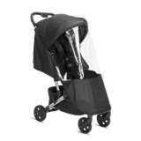 Compact stroller with matching black parent backpack and park icon