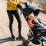 Parent using Black Cozy on stroller