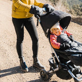 Parent using Black Cozy Mittens on stroller