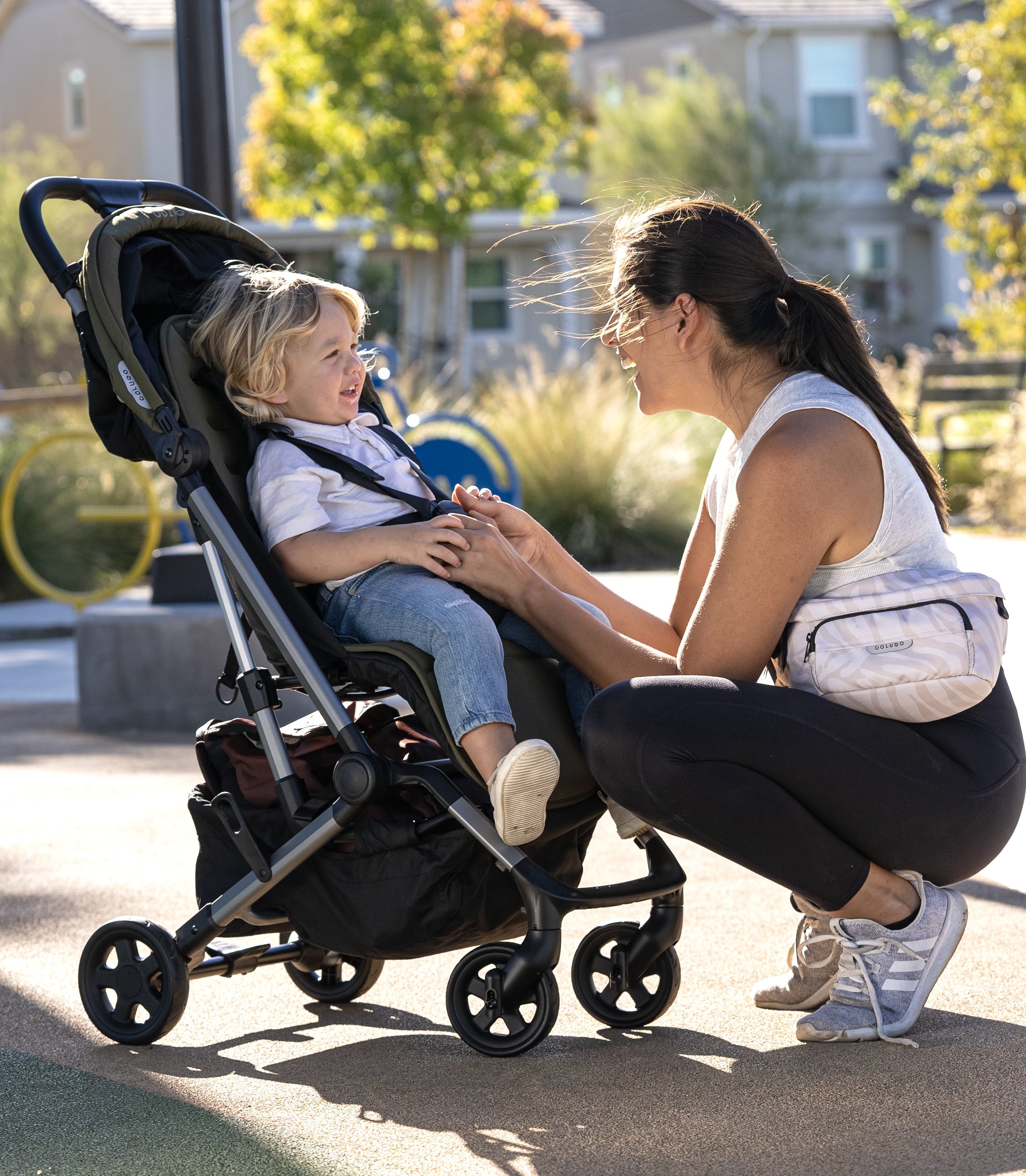 Compact Stroller Olive with child in seat