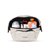 The On the Go Organizer, Dune Zebra holding pouches and wipes