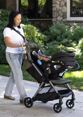 The One Stroller in Cool Grey with car seat adaptors