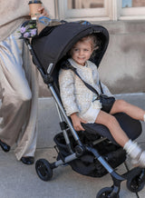 Travel-friendly black stroller and backpack combo