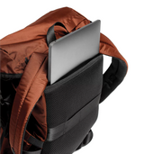 The Parent Backpack, Cocoa with a laptop inside the laptop sleeve