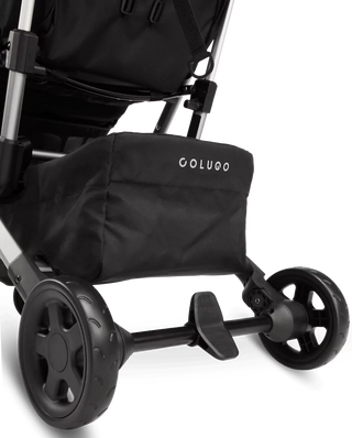 Black stroller in travel mode