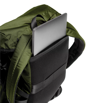 he Parent Backpack, Olive with a laptop inside the laptop sleeve