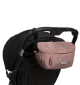 The On the Go Organizer, Rose Pink used as a fanny pack