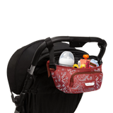 The On the Go Organizer, Red Bandana attached to a Colugo stroller